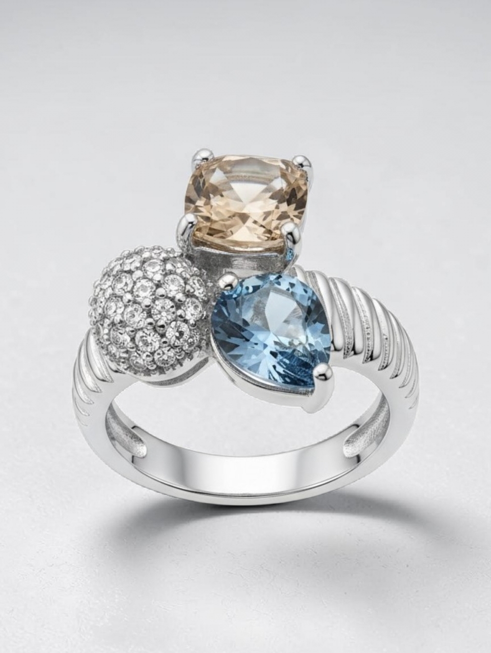 NWT EYE CANDY BRASS Multi-Stone Cocktail Ring with Blue and Champagne Stones